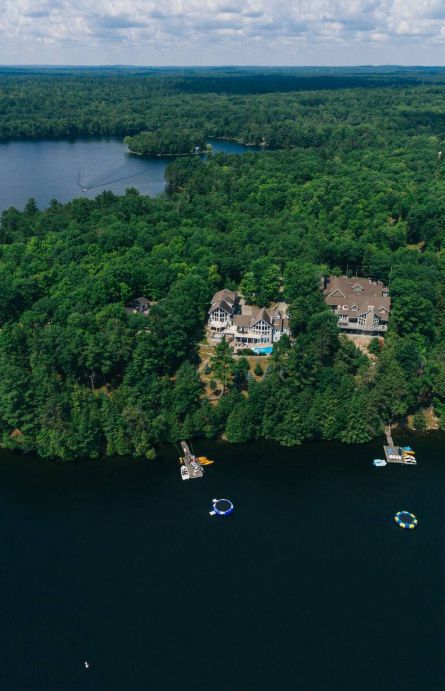 About Johnston & Daniel - aerial view of a waterfront property in Muskoka